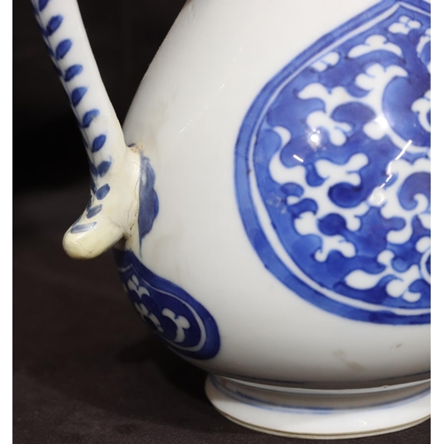 141 - An Oriental round bulbous shaped teapot on blue and white ground with scroll decoration, with cover,... 