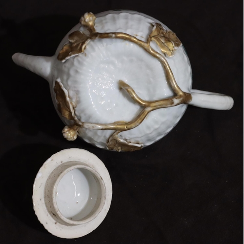 142 - A 19th Century Oriental small round bulbous shaped teapot with cover on white ground with multi-colo... 