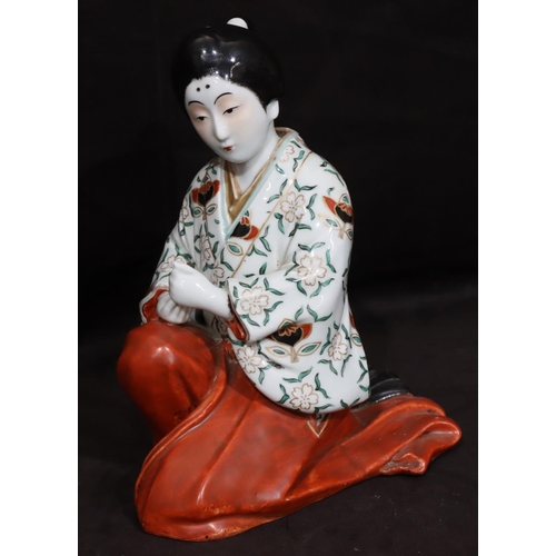 145 - A 19th/20th Century Oriental figure of a kneeling Geisha girl, 23cm high