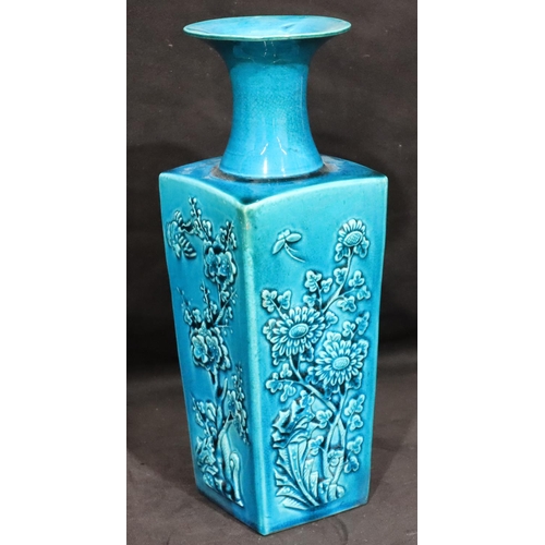 146 - A 19th Century Oriental square thin necked trumpet shaped vase on turquoise ground with raised flora... 