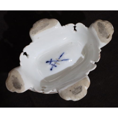 153 - A Meissen oval salt on white ground, later decorated with multi-coloured figure, bird and scroll dec... 