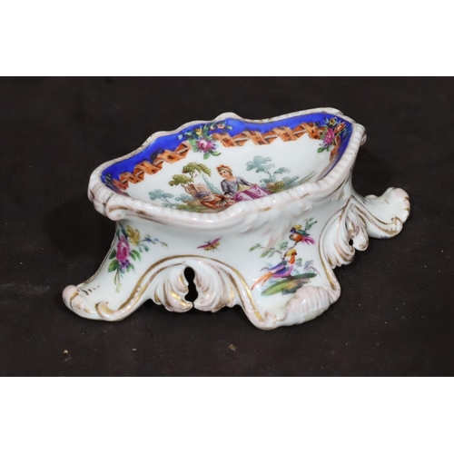 153 - A Meissen oval salt on white ground, later decorated with multi-coloured figure, bird and scroll dec... 