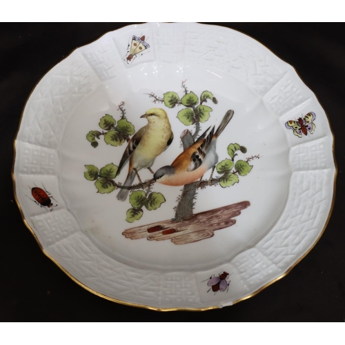 154 - A 19th Century Meissen round scallop shaped plate on white ground with multi-coloured perched bird a... 