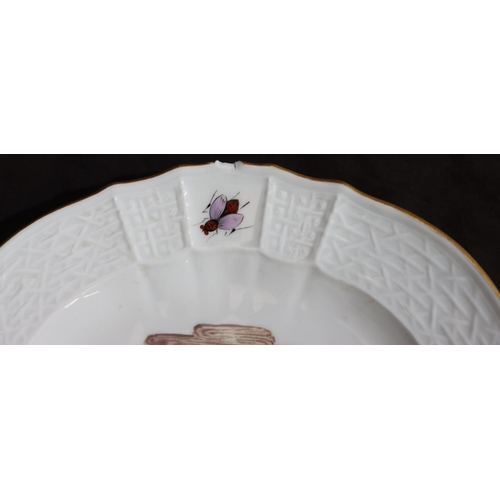 154 - A 19th Century Meissen round scallop shaped plate on white ground with multi-coloured perched bird a... 