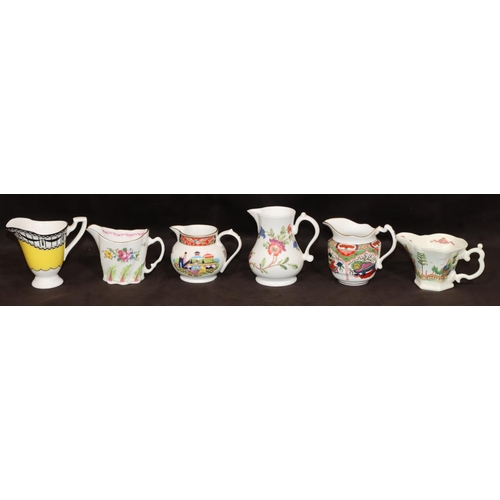 156 - 6 modern various Royal Worcester jugs on multi-coloured ground, largest, 9.2cm high