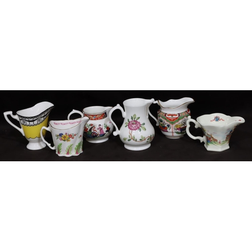 156 - 6 modern various Royal Worcester jugs on multi-coloured ground, largest, 9.2cm high