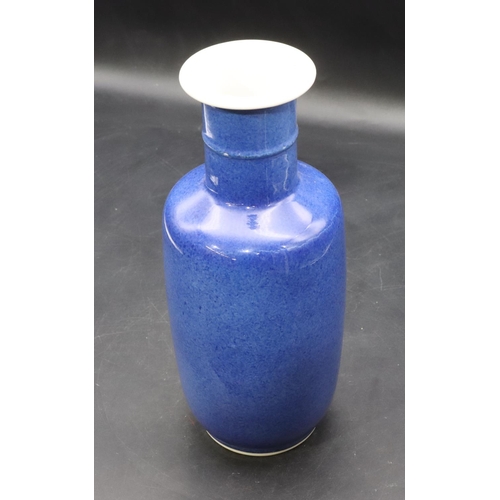 162 - A Chinese round bulbous thin necked trumpet shaped vase on blue ground, 25.5cm high