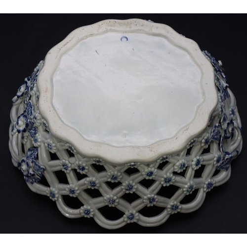 169 - An 18th Century Worcester blue and white oval 2-handled basket with pierced gallery and raised encru... 