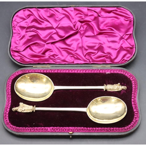 215 - A pair of Victorian silver gilt Apostle tablespoons in fitted black leather case, London 1890, 4.5oz