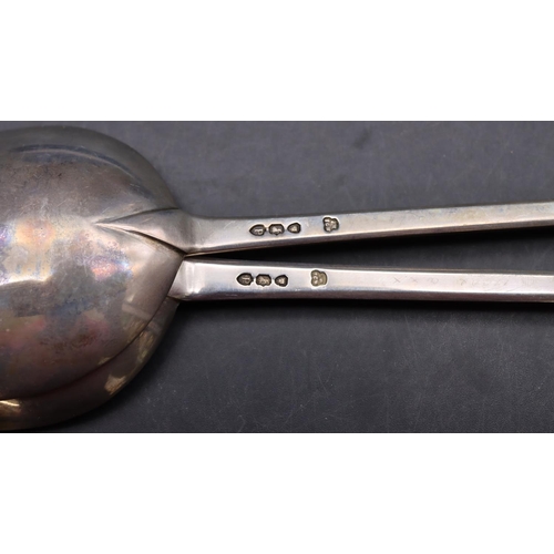 215 - A pair of Victorian silver gilt Apostle tablespoons in fitted black leather case, London 1890, 4.5oz