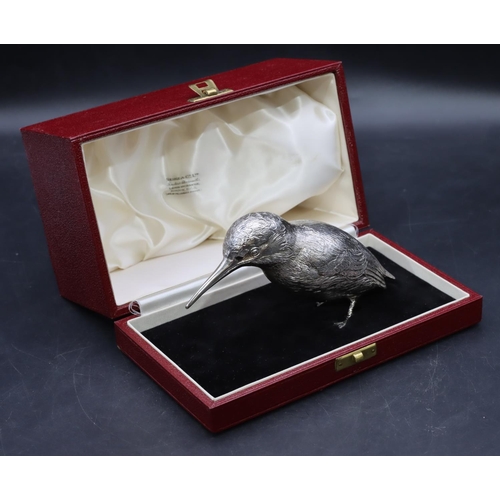 216 - An Elizabeth II silver model of a bird with allover chased decoration, London 1958, maker's mark EB,... 