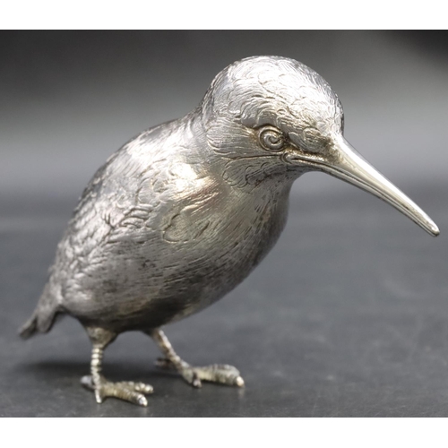 216 - An Elizabeth II silver model of a bird with allover chased decoration, London 1958, maker's mark EB,... 