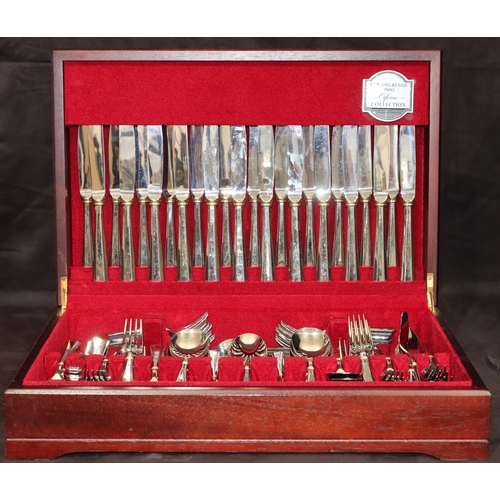 217 - Guy Degrenne stainless steel 12-place setting flatware service (complete) in fitted mahogany case