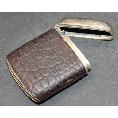 222 - A silver plated and leather vesta case with silver cartouche and hinged lid