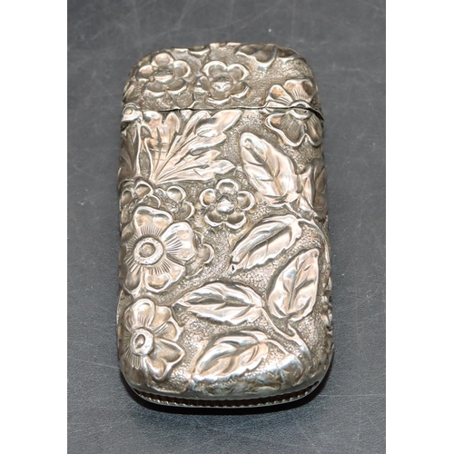 224 - A Victorian tall silver vesta case with floral and leaf decoration and hinged lid, Birmingham 1889, ... 