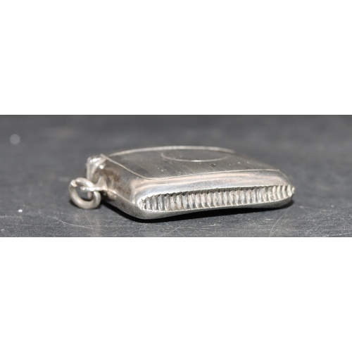 225 - A George V silver concave shaped cigarette case with engine turned decoration and hinged lid, Birmin... 