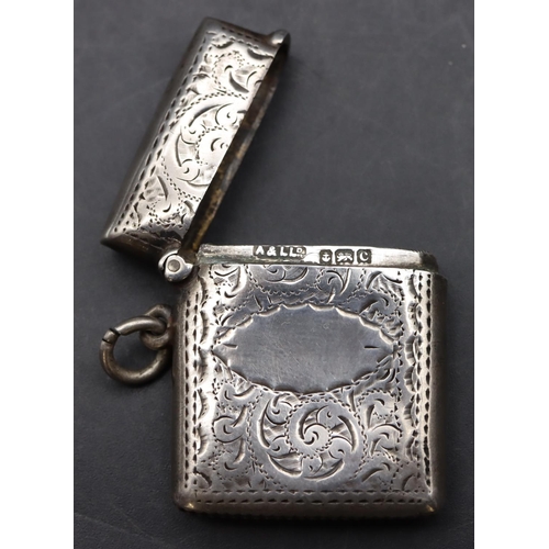 228 - An Edwardian silver vesta case with chased scroll and leaf decoration and hinged lid, Birmingham 190... 