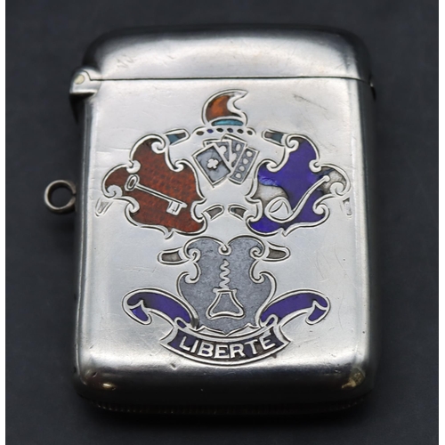 229 - An Edwardian plain Birmingham silver vesta case with hinged lid and enamelled crest motif inscribed ... 