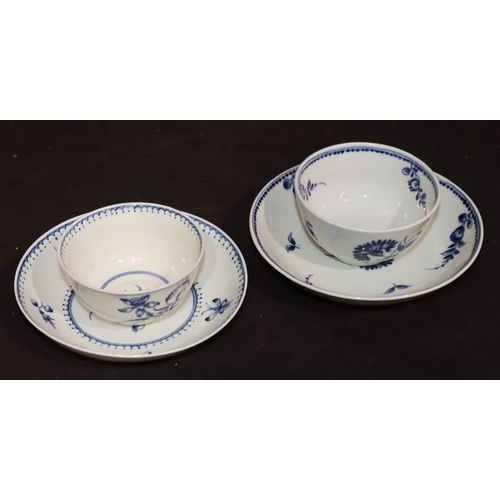 23 - An 18th Century Worcester blue and white tea bowl and saucer with allover floral and leaf decoration... 