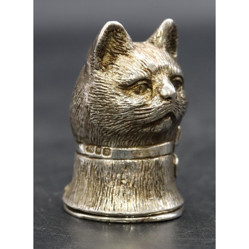 230 - A silver novelty vesta case in the form of a cat's head with hinged base, 3.6cm high, 0.73oz