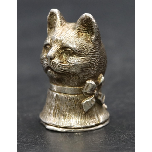 230 - A silver novelty vesta case in the form of a cat's head with hinged base, 3.6cm high, 0.73oz