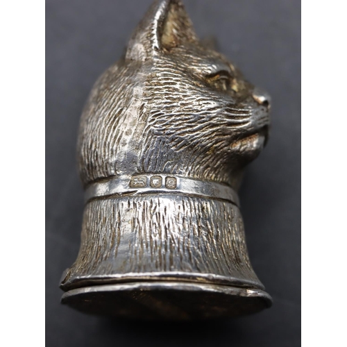 230 - A silver novelty vesta case in the form of a cat's head with hinged base, 3.6cm high, 0.73oz