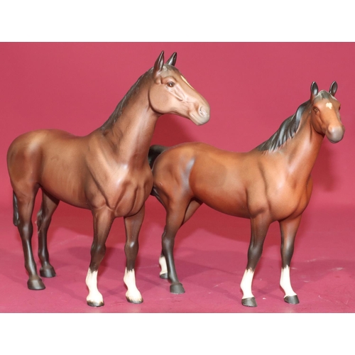 25 - 2 Beswick figures of horses, 23.5cm and 21cm high (2)