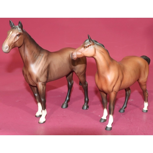 25 - 2 Beswick figures of horses, 23.5cm and 21cm high (2)