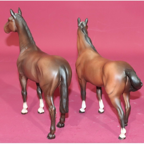 25 - 2 Beswick figures of horses, 23.5cm and 21cm high (2)