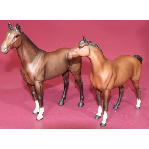 25 - 2 Beswick figures of horses, 23.5cm and 21cm high (2)