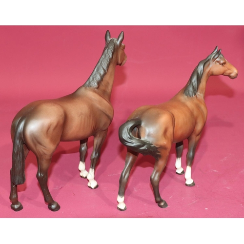 25 - 2 Beswick figures of horses, 23.5cm and 21cm high (2)