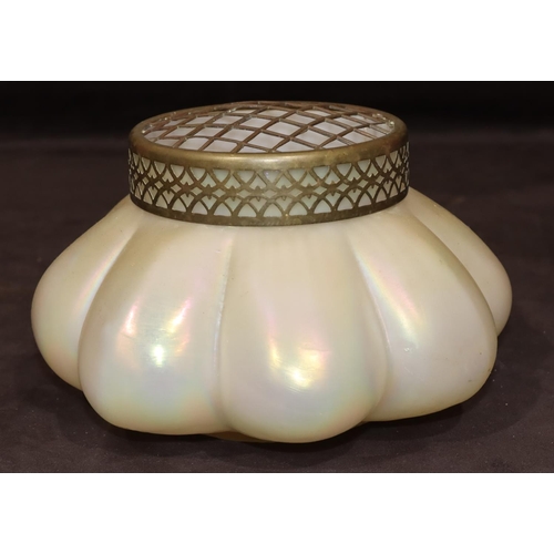 32 - An opaque glass bulbous shaped vase with gilt metal pierced top, 23cm wide