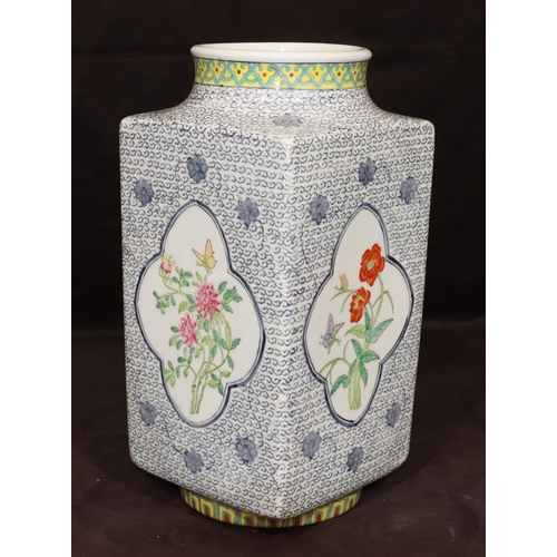 36 - A reproduction large Oriental square thin necked vase on white and blue ground with multi-coloured b... 