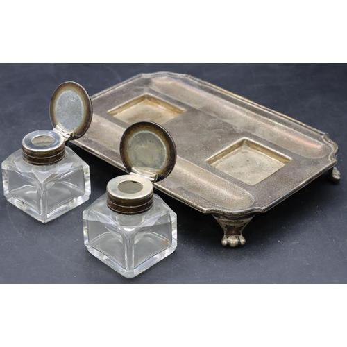 375 - An Edward VII silver rectangular shaped inkstand mounted with 2 square cut glass inkwells with silve... 