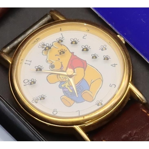 382 - 3 children's watches, a Disney watch depicting Tigger with leather strap (boxed), A Mil-Looney-UM wa... 