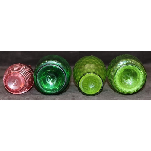 39 - 3 green glass Victorian round bulbous shaped jugs with reeded handles, 19cm high and a smaller Victo... 