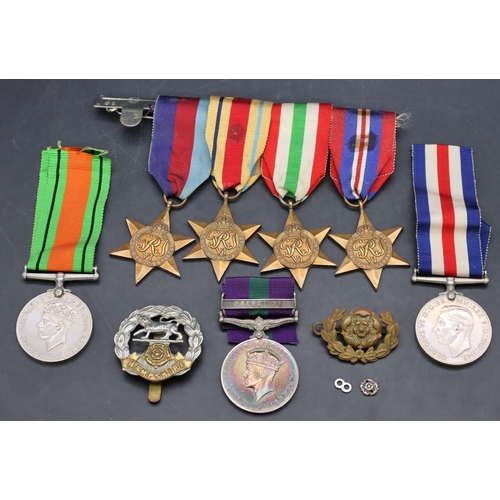 394 - A set of 7 WWII military medals, Palestine Medal 2050831.Pte.E.G.Tickner. Hamps.R with 1939/45 medal... 