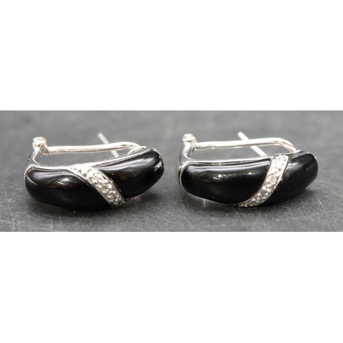 397 - A pair of 14ct white gold and black onyx earrings, 5.2 grams gross