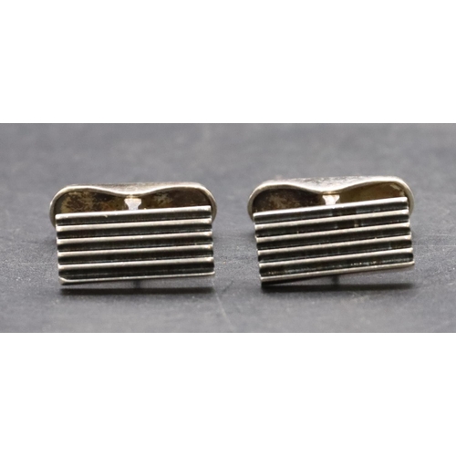 416 - A pair of Georg Jensen gentlemen's silver cufflinks, 14.7 grams