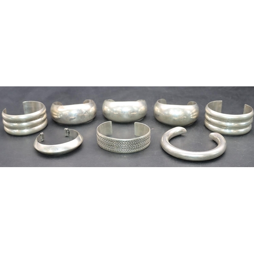 418 - 8 various silver bangles, 238 grams