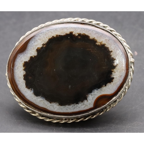 419 - A large oval silver agate brooch, 7.2cm wide, overall weight 34 grams