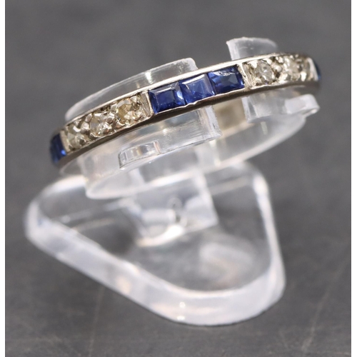 438 - A platinum/white gold sapphire and diamond full eternity ring, size M/N, 2.2 grams gross