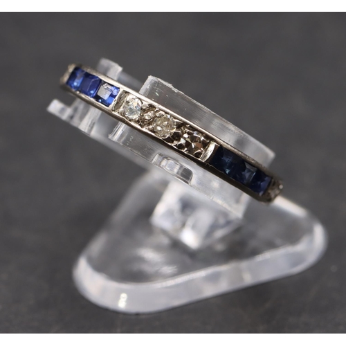 438 - A platinum/white gold sapphire and diamond full eternity ring, size M/N, 2.2 grams gross