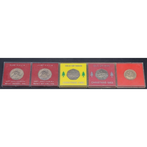 477 - 2 Isle of Mann Christmas 50p coins (cased) and other cased coins and a selection of various 50p coin... 