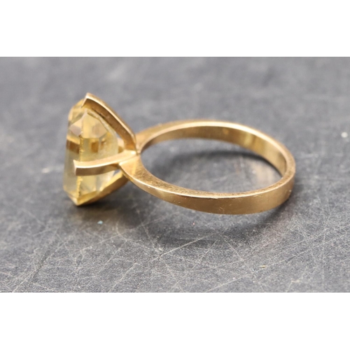 490 - A Continental gold Citrine style ring, size N, 3.9 grams gross