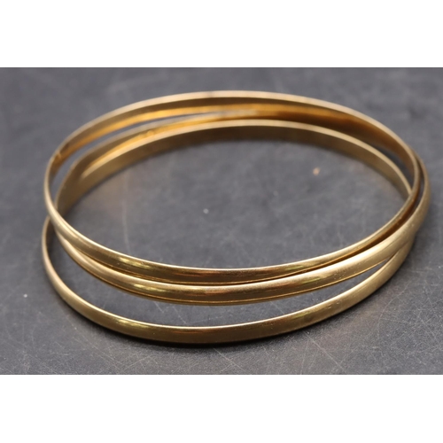 498 - 3 9ct gold bangles, 27 grams