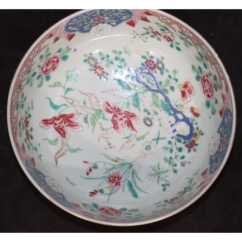 5 - An Oriental round bowl on white ground with blue and green floral, leaf and scroll decoration, 21cm ... 