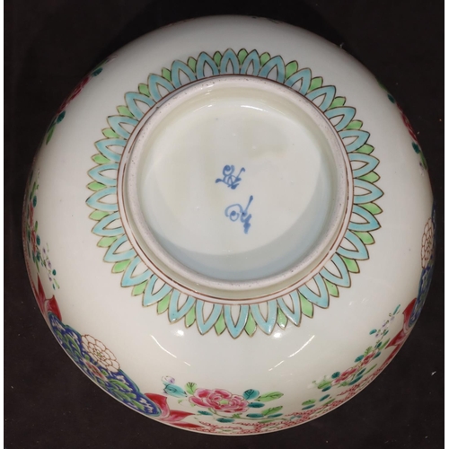 5 - An Oriental round bowl on white ground with blue and green floral, leaf and scroll decoration, 21cm ... 