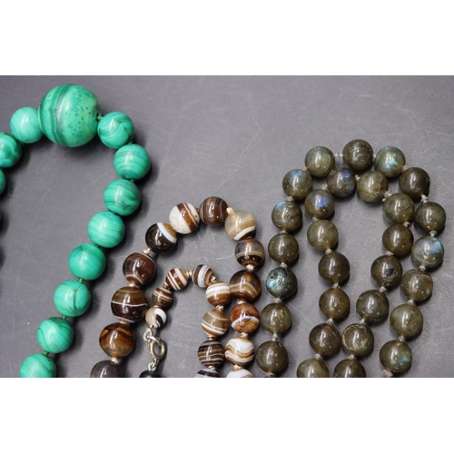 504 - An unusual green hardstone bead necklace, a malachite graduated bead necklace with 9ct gold clasp an... 