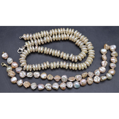 507 - A Mother of Pearl bead necklace with 9ct gold clasp and a similar necklace (2)